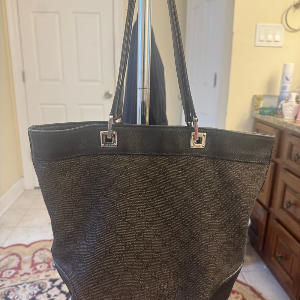 black vintage Gucci bucket bag